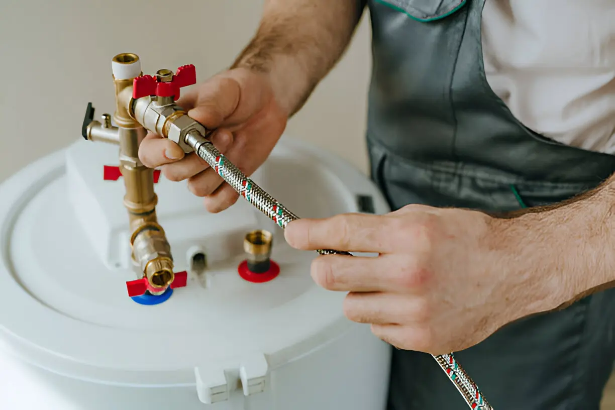 Home 14 Licensed technician servicing a residential heating system during winter in Orlando